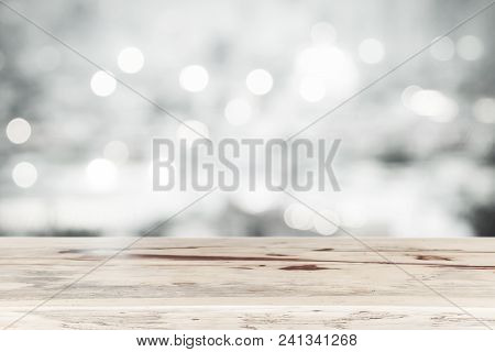 Empty Wood Table Top For Show Product With Blurred Light Bokeh Background. Picture For Add Text Mess