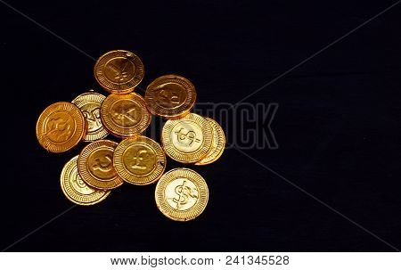 Gold Coin With Many Kind Of Currency Write On It