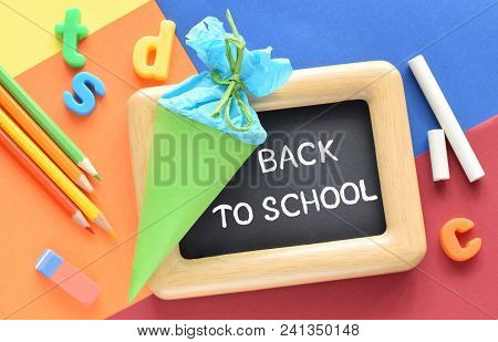 Back To School Background With Chalkboard And Sweetens