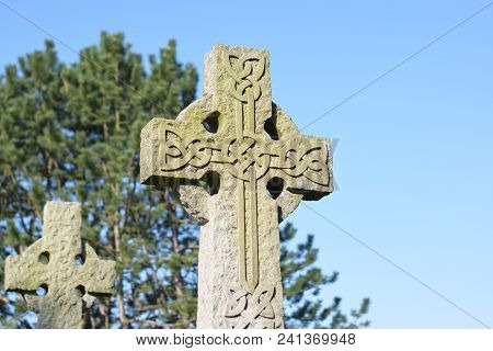 Picture Of A Scottish Celtic Cross In A Graveyard