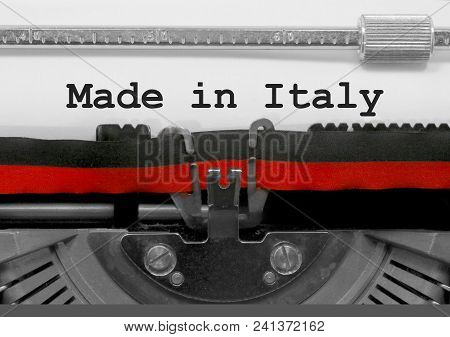 Made In Italy Text Written By An Old Typewriter On White Sheet