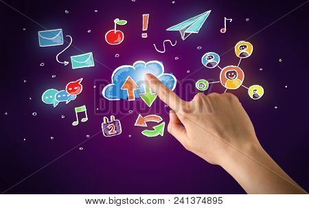 Female hand toucing mixed media icons with purple background