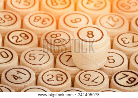 Lucky Number 8 On The Background Of Wooden Keg Lotto. Close Up