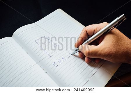 Hangman Traditional Game. Hand With Pen Writes Word Money