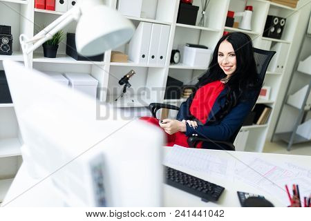 Portrait Of A Young Girl In A Suit. Beautiful Girl Is Working In The Office.