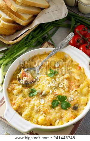 Casserole Crumble With Red Fish, White Bread And Cheese On Stone Or Slate Background. Proper Nutriti