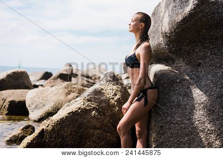 Sexy Young Beautiful Russian Girl In Little Black Bikini. Slim Body Woman On Tropical Beach In Thail