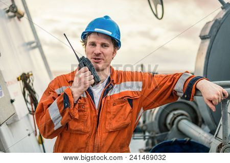 Marine Deck Officer Or Chief Mate On Deck Of Marine Vessel Or Ship , Wearing Ppe Personal Protective