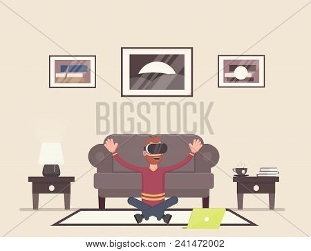 The Guy Is Sitting And Playing In The Room In Virtual Reality.