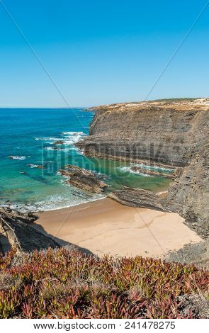 Beach With Rocks In Praia Do Cavaleiro In Alentejo, Portugal