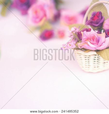 Close Up Colorful Rose Bouquet In Small Basket On White Background For Wedding Or Valentine Card. Pa