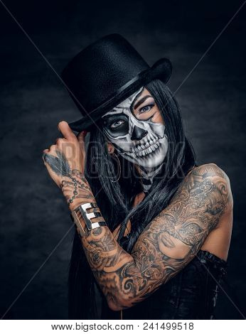 Portrait Of Zombie Woman With Painted Skull Face.