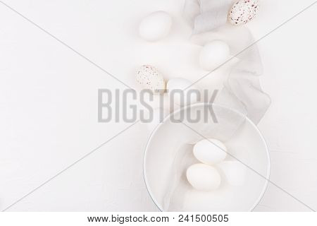 Stylish Background With White And Yellow Easter Eggs In Bowl And Silk Fabric With Copy Space. Isolat