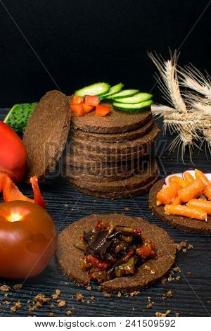 Towel Of Black Bread Gallets With Vegetables - Cucumber, Radish, Red Paprika, Mini Carrot, Eggplant 