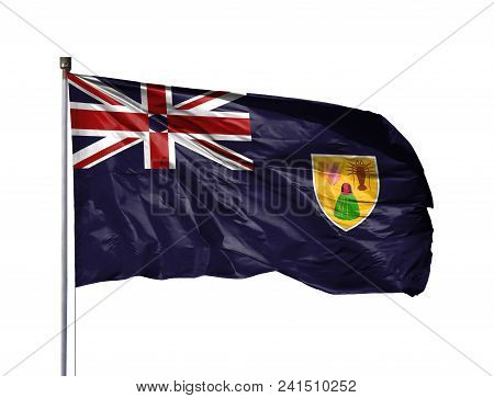 National Flag Of Turks And Caicos Islands On A Flagpole, Isolated On White Background.