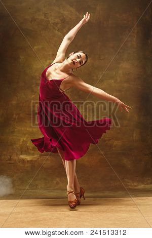 Young Female Ballet Dancer - Harmonious Pretty Woman In Red Dress Posing In Studio - Contemporary Da