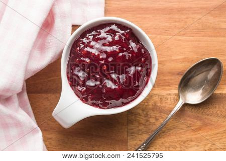 Raspberry jam jelly in bowl. Top view.