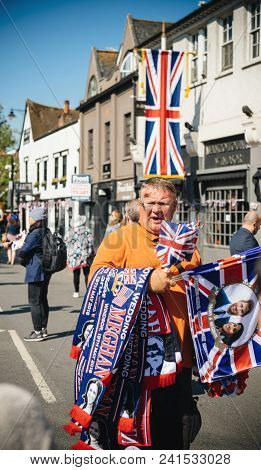 Windsor, Berkshire, United Kingdom - May 19, 2018: Man Selling Flags With Portrait Of Prince Harry A