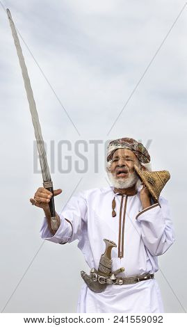 Ibri, Oman, 28th April 2018: Men Dancing And Singing Omani Traditional Way