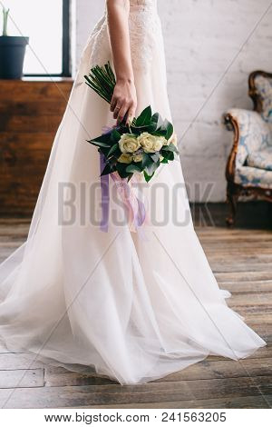 Wedding Bouquet In The Bride's Hand