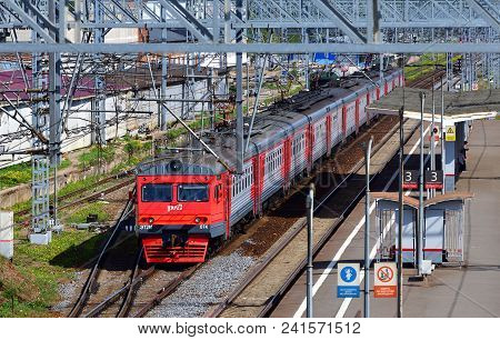 Skhodnya, Russia - May 09. 2018. The Train Of The Company Rzd Arrives At The Station.