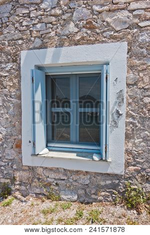 Blue And White Window On An Old Greek House Made Of Stone, Panormos Bay, Skopelos Island, Greece