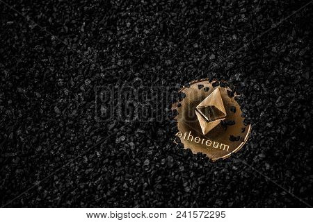 Crypto Currency Ethereum. Gold Etherium Coin On Black Background