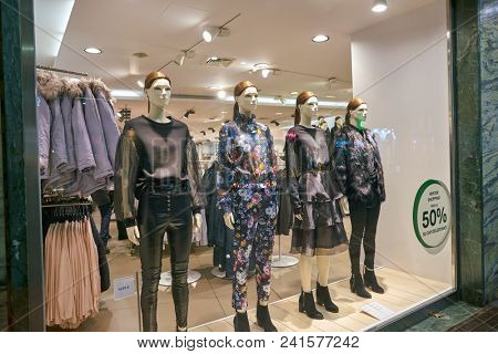 MILAN, ITALY - CIRCA NOVEMBER, 2018: shop window display of clothing at H&M store in Milan, Italy.