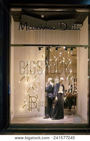 MILAN, ITALY - CIRCA NOVEMBER, 2018: shop window display of clothing at a Massimo Dutti store in Milan, Italy.