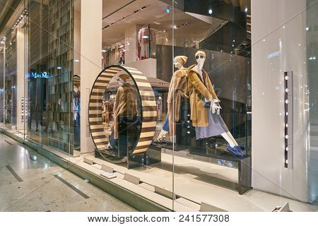 MILAN, ITALY - CIRCA NOVEMBER, 2018: shop window display of clothing at MaxMara store in Milan, Italy.