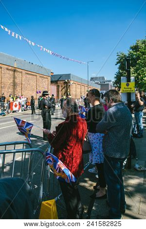 Windsor, Berkshire, United Kingdom - May 19, 2018: Man In Elegant Red Velevet Suite Waiting For Roya
