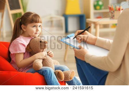 Cute little girl at child psychologist's office