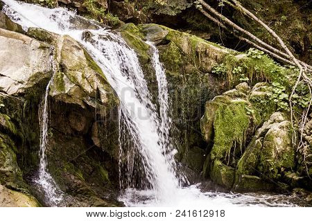 View Of Kamianetskyi Waterfall Is Located On The Kamianka River (a Right Tributary Of The Opir River