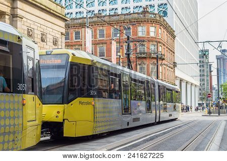 A Tram On The Metrolink Light Rail System In The City Centre Of