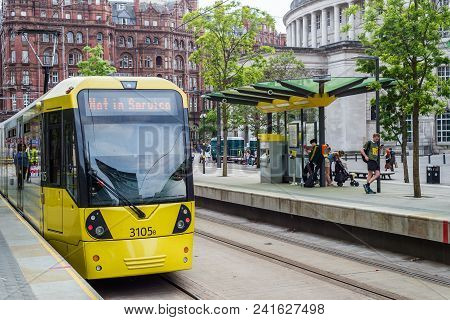 A Tram On The Metrolink Light Rail System In The City Centre Of