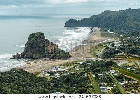 Aerial View Of Town On Seashore On Cloudy Day, Piha Beach, New Zealand