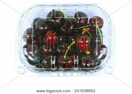 Sweet Cherries In The Plastic Pack Isolated On A White Background With A Clipping Path. View From To