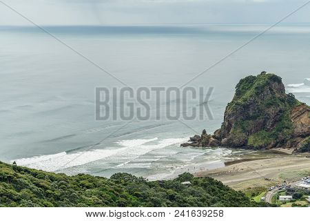 Aerial View Of Beach And Rocky Cliff On Cloudy Day, Piha Beach, New Zealand