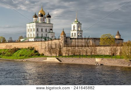 View Of The Pskov Krom Or Kremlin From The Velikaya River At Sunset, Russia