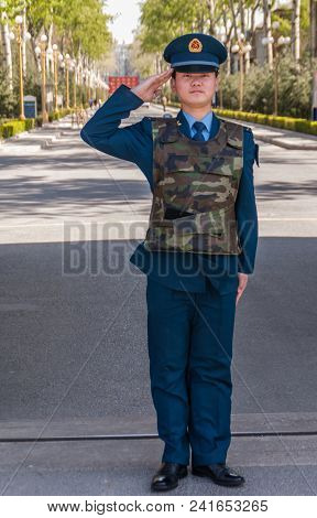 Beijing, China - April 29, 2010: Young Fierce And Proud Male Air Force Officer In Blue Uniform Salut