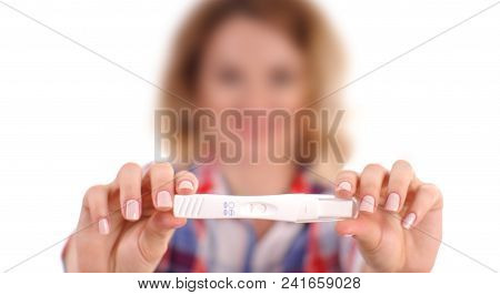 Happy Woman Showing A Positive Pregnancy Test