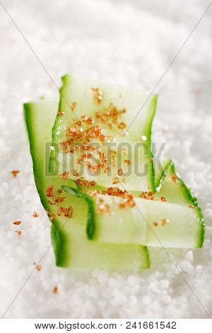 Hawaiian Red Gold Salt with cucumber slice ...