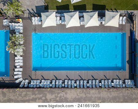 pool in mediterranean garden architecture in top view. Photo from the drone
