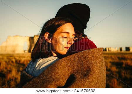 Couple hiking together in the wilderness