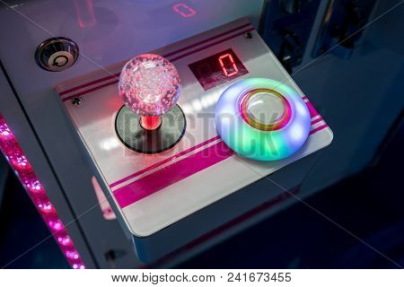 Joy Stick Panel For Arcade Game Controller. Selective Focus On Illuminated Round Button.