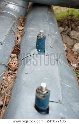 Metal Pipes With Therm Isolation,  Flanges With Bolts And Nut. Flanged Pipes With Valve Connected By