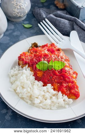 Flounder With Tomato Sauce And Boiled Rice, Selective Focus