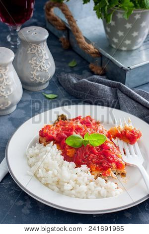 Flounder With Tomato Sauce And Boiled Rice, Selective Focus