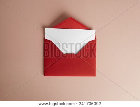 Mockup Envelope And White Blank Sheet On Empty Color Desk. Business Empty Mock-up Background For Mes