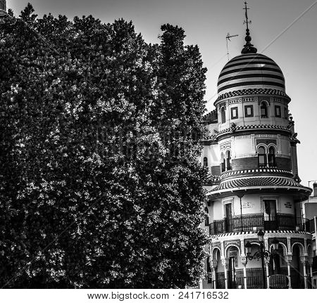 Edificio De La Adriatica In Black And White In Sevilla In Spain